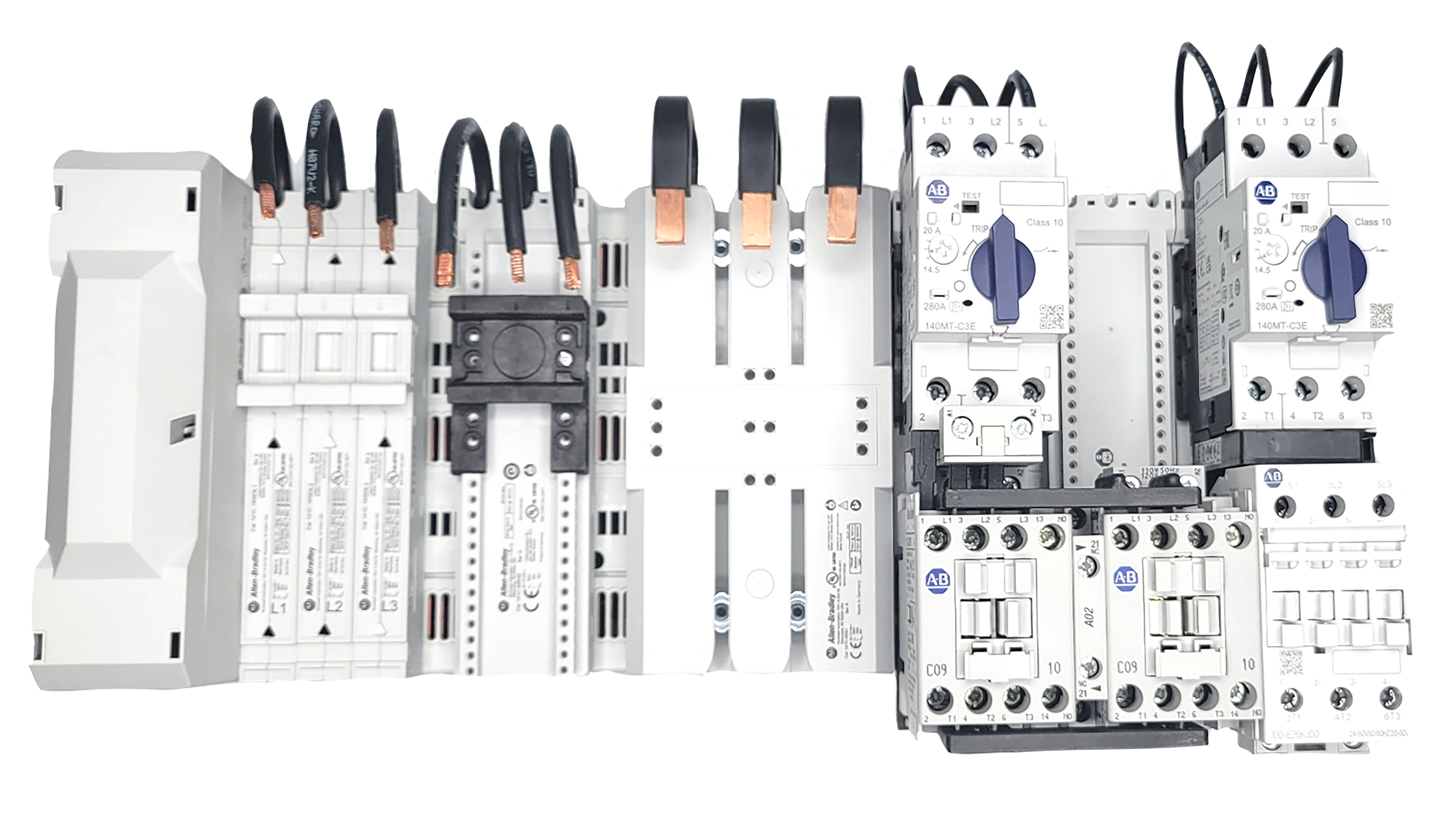 Grey plastic CrossBoard System panel covered in motor protection components. In the middle third of the panel you can see space between mounted components with the dark holes meant for snapping components on.