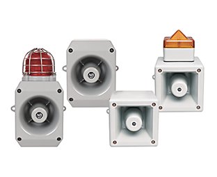 Four AB Electronic Horns. The two on the left with a slightly longer profile and darker grey corrosion free coating –the leftmost horn has a red hazardous location beacon mounted on the on the top. The two on the right, more square in shape and made of white plastic. The horn furthest to the right has an amber beacon mounted on the top.